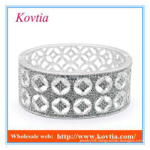 Expensive fine jewelry wide silver jamiaca bangle micro pave crystal